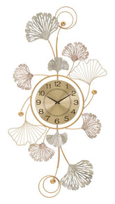 Horloge murale décorative avec feuilles et motifs abstraits