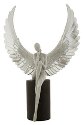 Statuette argentée avec ailes déployées