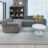 Canapé modulable Celinda en velours côtelé gris