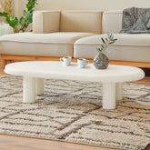 Table basse Clivo arrondie 160 cm avec pieds colonnes crème