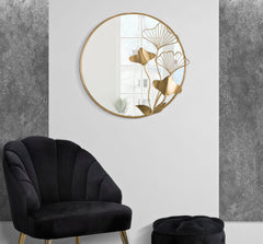 Miroir mural rond doré avec décoration florale