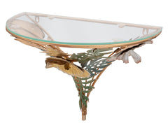 Table de chevet semi-circulaire en métal doré et verre décorée de feuilles et fleurs multicolores