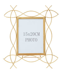 Cadre photo en métal doré design sinueux