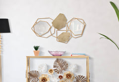 Miroir mural géométrique métal doré