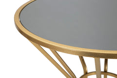 Table ronde métallique dorée avec dessus en verre miroir
