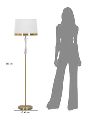 Lampe de sol en métal doré abat-jour en tissu blanc bordures dorées décor transparent