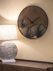 Horloge murale ronde métal et bois sculptures feuilles