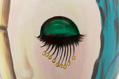 Vase en céramique décor visage avec décorations dorées