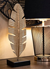 Décor feuille dorée sur base noire