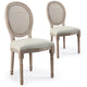 Lot de 2 chaises médaillon en bois patiné avec cannage et tissu beige
