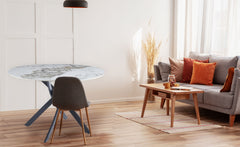 Table ronde Callini céramique marbre blanc 120cm pieds croisés métal noir