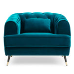 Fauteuil capitonné en velours bleu canard