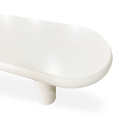 Table basse Clivo arrondie 160 cm avec pieds colonnes crème